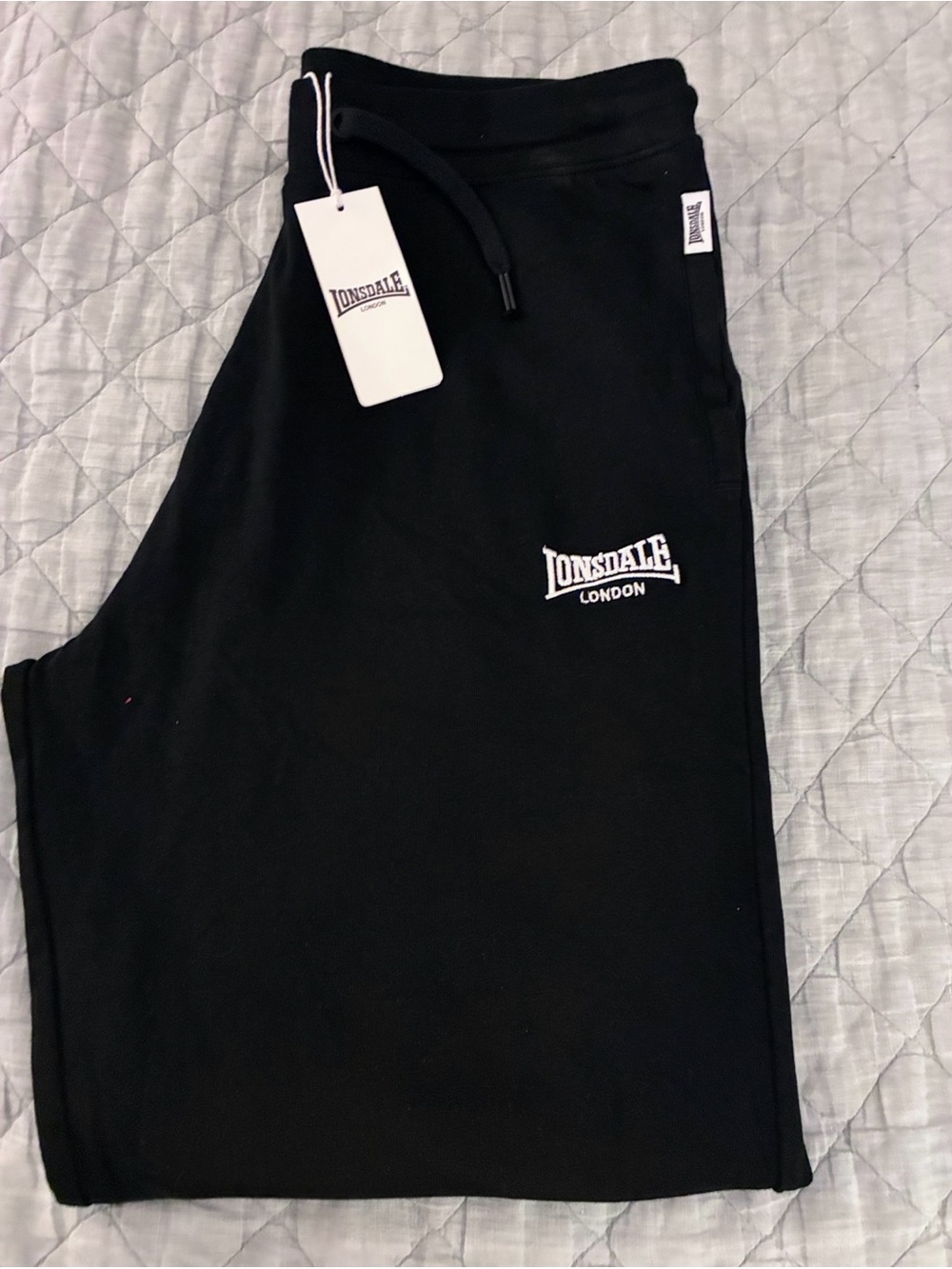Lonsdale Men’s size large  black sweatpants with white logo and tag.